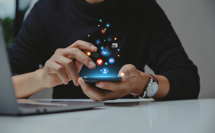 Hand of young business using smartphone, Social media concept