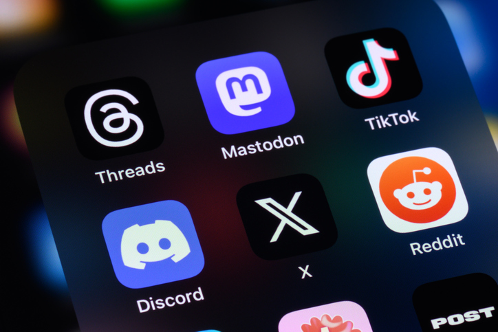 Toronto, Canada - August 4, 2023: Popular social networking apps, including Threads, Mastodon, TikTok, Discord, X (formerly Twitter), Reddit and Post on an Apple iPhone.